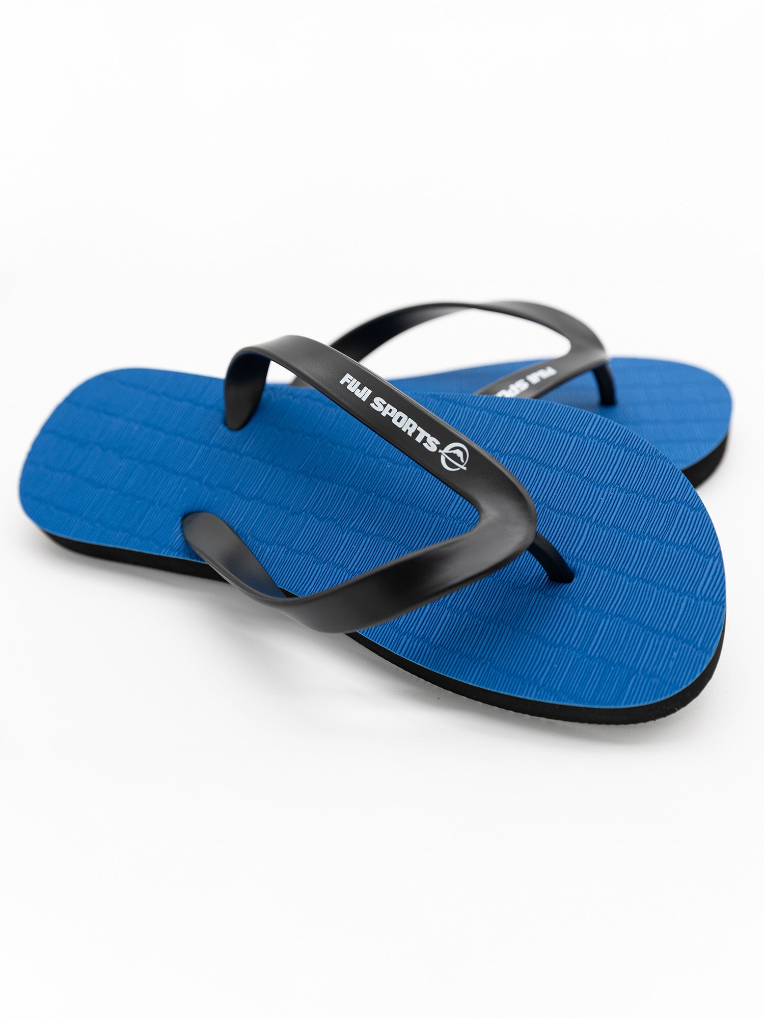 A pair of FUJI Authentic Tatami Sandals Blue with black straps and the white Fiji Sports logo on the strap, displayed on a plain white background.