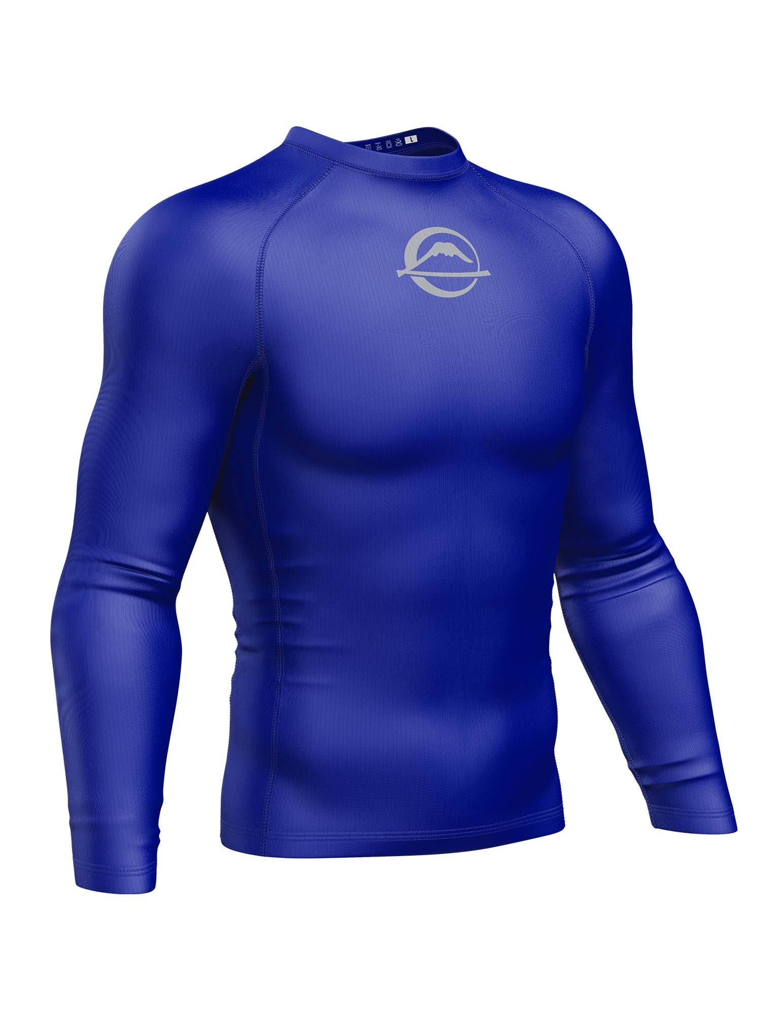 The Baseline Ranked Long Sleeve Rashguard Blue is a fitted, bright blue athletic shirt with a crew neck, smooth stretchy fabric, and features a small white mountain logo and circular design on the upper chest.