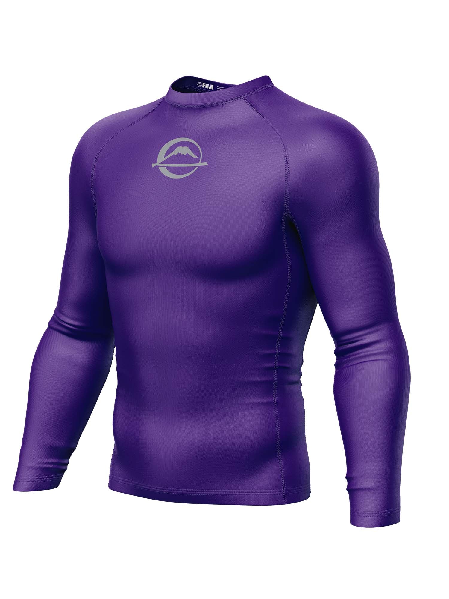 The Baseline Ranked Long Sleeve Rashguard Purple features a fitted design, white circular mountain logo on the chest, and is shown on an invisible mannequin against a white background.