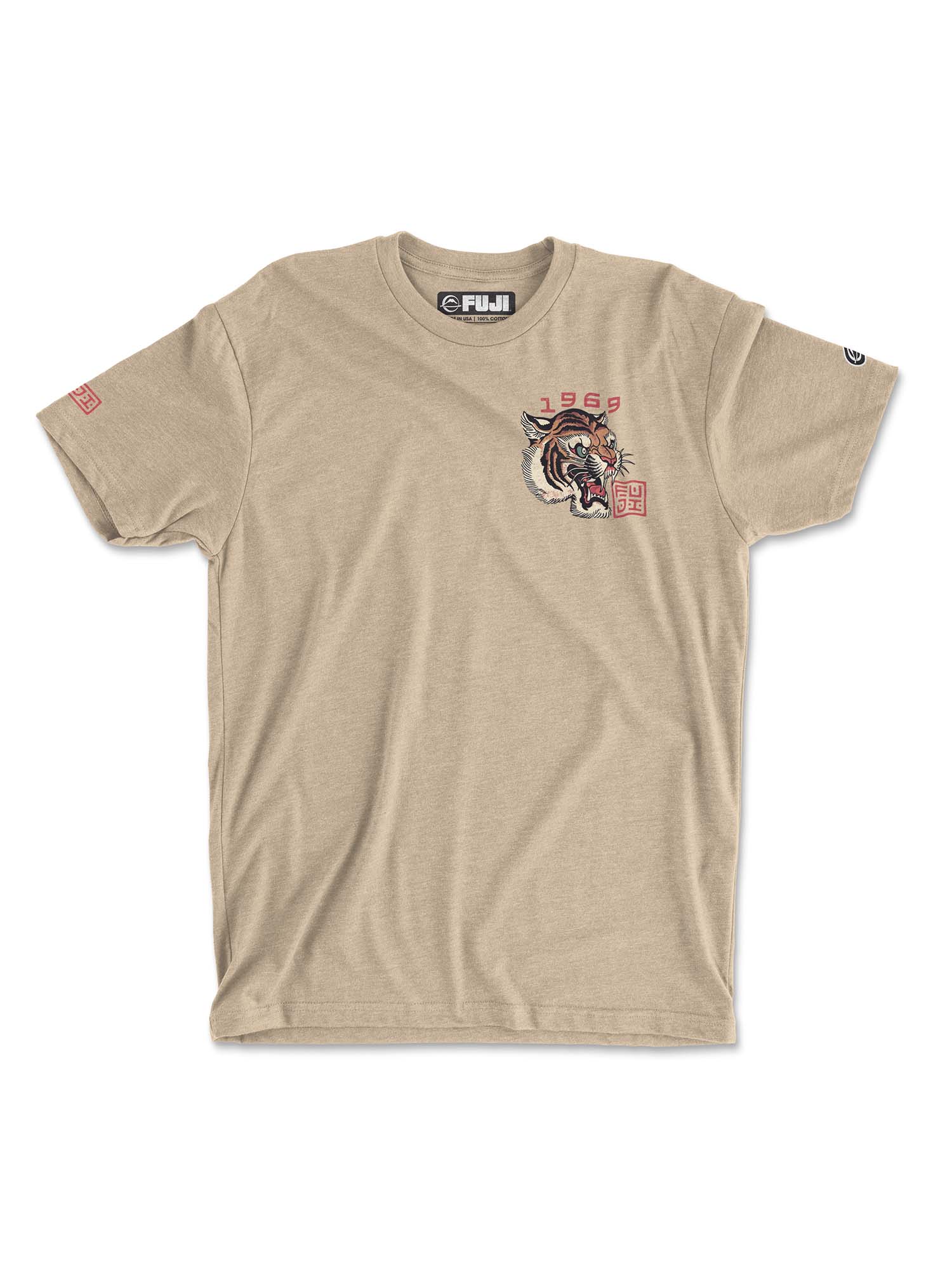 The Tora T-Shirt Cream is a beige short-sleeve tee featuring a small tiger head, red "1969" text, and Japanese characters on the left chest, plus red graphics on the right sleeve and a Fuji label on the collar.