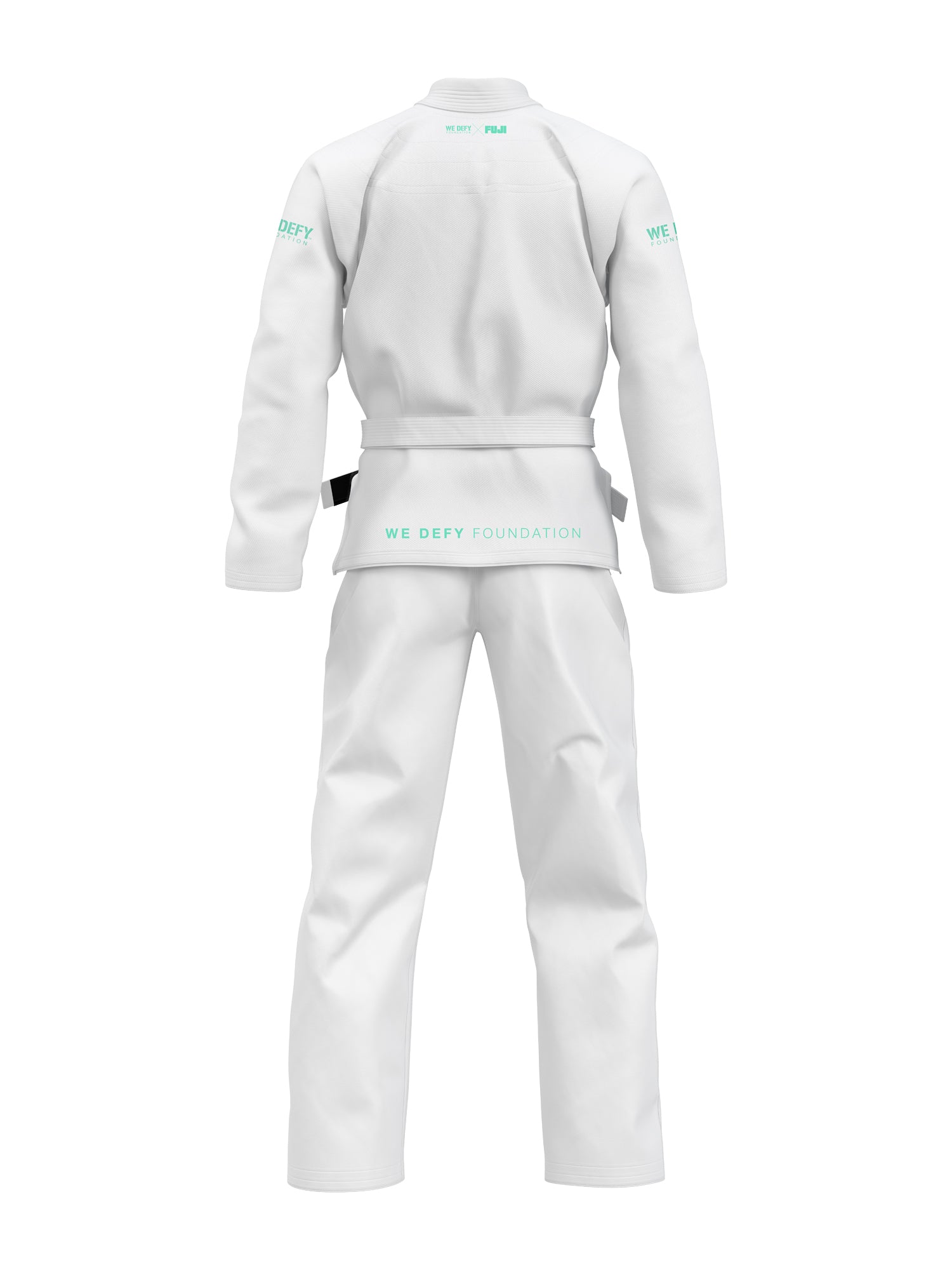A person faces away, wearing the We Defy Comp Standard BJJ Gi White with a black belt. Light green "WE DEFY FOUNDATION" text appears on the back and sleeve of the gi.
